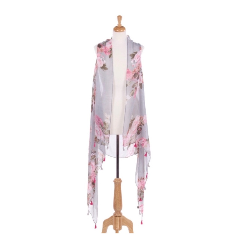 Sleeveless vest with a large floral print.